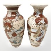 A pair of 20th century Japanese earthenware baluster vases,