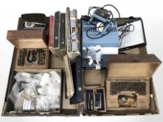 A collection of horologist's equipment, hardware including watch parts, movements, related volumes,