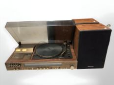 An FG Servo motor automatic turntable and a pair of National Panasonic speakers.
