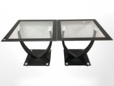A pair of contemporary glass lamp tables,