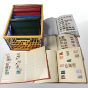 Nine stamp albums containing assorted 20th century stamps.