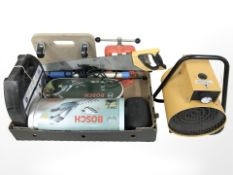 A group of tools and hardware including heater, Bosch hand held hedge trimmers, tyre chains,