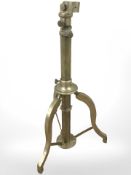 An antique brass telescope stand, height 49 cm.