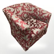 A contemporary armchair in floral fabric width 76 cm