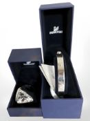 A Swarovski bangle and a faceted stone dress ring, both boxed.