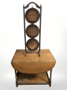 An oak barley twist drop leaf table and an Edwardian cake stand.