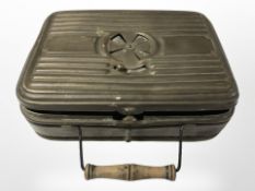 A French Girodon brass foot warmer.