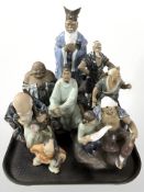 A collection of oriental earthen ware figures of elders,