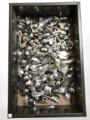 A large quantity of collector's spoons.
