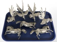 A group of seven silver plate rearing horse and cockerel ornaments.