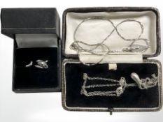 A silver Hot Diamond arrow shaped pendant on chain, a further chain and a silver mouse ring.