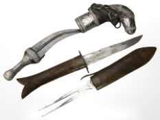 An Arabic jambiya knife in ornate silver plated sheath, length 29 cm,