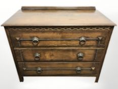 An Edwardian oak three drawer chest, 94 cm x 46 cm x 76 cm.