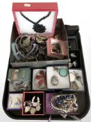A large quantity of costume jewellery including gemstone and enameled pieces, bangles, pendants,
