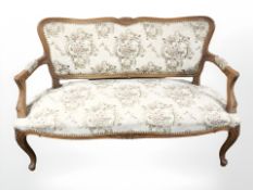 A French style two seater salon settee in floral upholstery width 155 cm