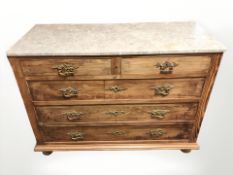 An early 20th century continental pine five drawer chest,
