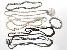 A group of pearls and stained pearl necklaces,
