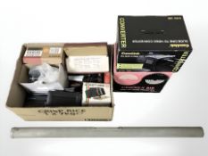 A boxed Cam Link cine video converter, Cinerex 818 movie projector, cassette carrier, adaptor,