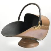 A Victorian copper coal scuttle, length 41 cm.