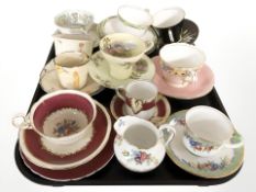 A collection of Aynsley, Paragon and other tea cups, coffee cans and saucers.
