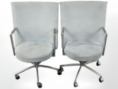 A pair of Danish Erik Jorgensen designed 'Partner' chrome-framed executive swivel armchairs,