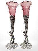 A pair of Victorian silver plate and cranberry glass bud vases, the fluted,