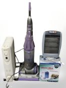 A Dyson vacuum cleaner, a heater, humidifier and a radiator.