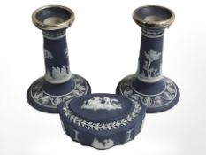 A pair of Wedgwood Jasperware squat candlesticks, height 12 cm,