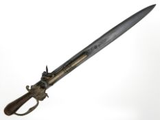 A reproduction flintlock sword pistol, length 64 cm.