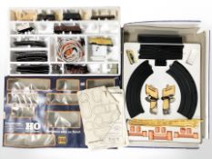 A Piko HO gauge train set and a racing set.