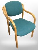 A Scandinavian laminated wood office chair.