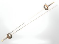 A pair of fencing foils, length 110 cm.