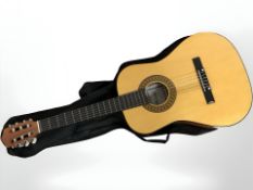 A Herald HL34 classical guitar with soft carry bag.