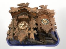 Two reproduction cuckoo clocks