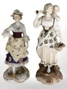 Two 20th century German porcelain figures in the style of Meissen, depicting ladies, tallest 24 cm.