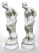 After the antique : A pair of late 19th century plaster figures of Venus bathing, height 47 cm.