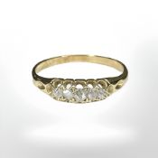 A five stone old-cut diamond ring, unmarked, size N CONDITION REPORT: 1.