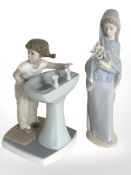 Three Lladro figures including girl holding daffodils,