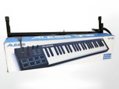 An Alesis V49 K-USB midi keyboard controller in box,
