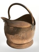 A Victorian copper coal bucket, height 26 cm excluding handle.