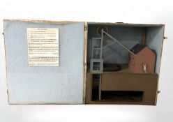 A wooden cased model of a 19th century shaft coal mine, width 48 cm.