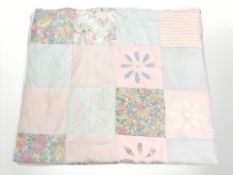 A patchwork quilt, 417 cm x 288 cm.