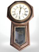An Ansonia Clock Company American wall clock, with pendulum, length 82 cm.