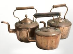 Three Victorian copper kettles.