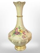 A Royal Worcester tapered and part-fluted vase decorated with flowers on blush ground, shape 1538,