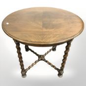 A walnut barley twist circular occasional table, diameter 70 cm.