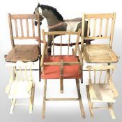 A group of child's folding chairs,
