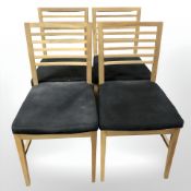 Four blonde oak dining chairs