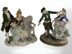 Two German Sitzendorf porcelain figure groups, one depicting a lady and gentleman on a salon settee,