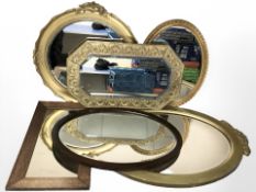 A group of wood, brass and gilt mirrors.